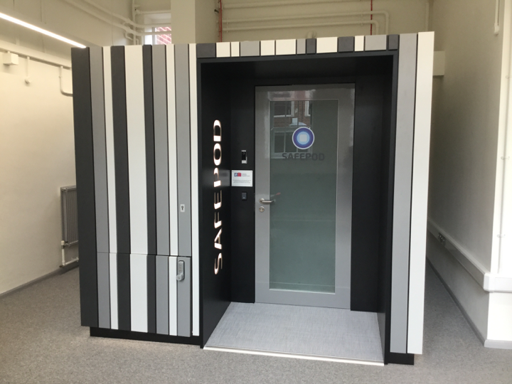 Outside view of secure environment SafePod featuring separate room and lockable door