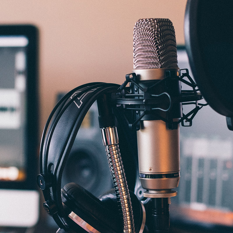 silver microphone and headphones